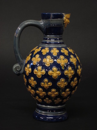 A Mintons Majolica style blue glazed jug, the base marked 596 Mintons, handle and spout f and r, 9"