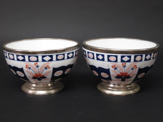 A pair of Derby style bowls with silver mounts, the base marked Galle Face Hotel Colombo 10"
