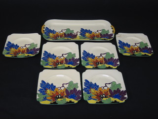 A 7 piece Royal Doulton Gloria pattern sandwich set comprising  13" twin handled bread plate and 6 square plates 6", based  marked D4937
