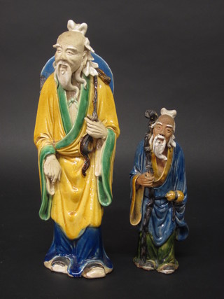 An Oriental figure of a standing Sage 14" and 1 other 9"