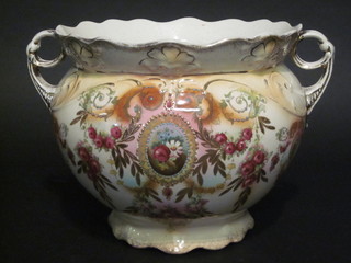 A brown glazed pottery twin handled jardiniere with floral  decoration 10"
