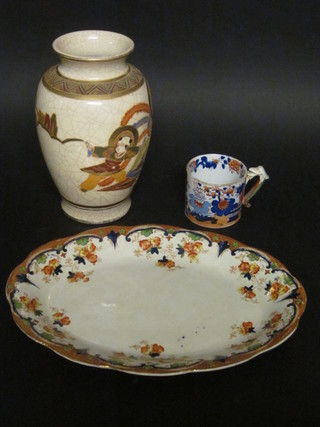 A late Japanese Satsuma vase decorated court figures 10", an  oval pottery meat plate with floral decoration 14" together with a  Masons mug, handle f,