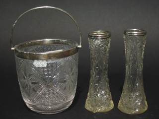 A circular cut glass ice pail with silver rim 5" and 2 waisted cut  glass vases with silver rims 6"