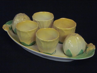 A Carltonware Australian design yellow leaf patterned 4 piece  egg cruet raised on a stand