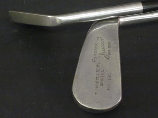 2 golf clubs by T Harris & Sons - an iron and a Mashie