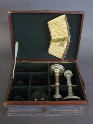 A pair of Safari style chrome candlesticks by Herwood Ltd,  contained in a carrying case
