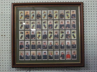 A set of 50 Wills cigarette cards - Naval Dress and Badges, framed