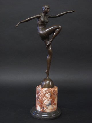 A bronze Art Deco style figure of a dancer, raised on a marble  base 23"