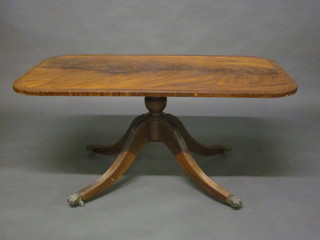 A Georgian style rectangular inlaid mahogany coffee table, raised  on pillar and tripod supports 48"