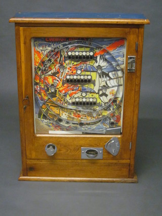 A Cannonballs wall mounting amusement machine by Wonder Matics, contained in an oak case 25"
