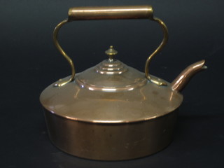 A circular copper kettle 7"