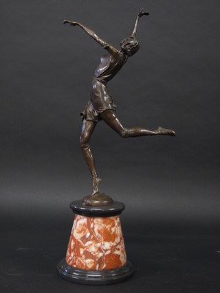An Art Deco style bronze figure of a dancing lady, raised on a marble base 26"