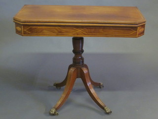 A 19th Century inlaid mahogany lozenge shaped tea table, raised  on pillar and tripod supports 35"  ILLUSTRATED  FRONT COVER