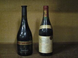 A bottle of 1995 Zonnenbloem Special Reserve Pinotage and a bottle of 1983 KWV Roodeberg