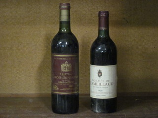 A bottle of 1990 Domaine de L'ameillaud and a bottle of 1982  Chateau Larose Trintardon Haut Medoc