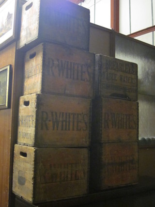 6 wooden R White Lemonade bottle crates together with a Brearleys Table Waters crate
