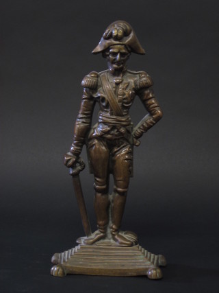 A bronze door stop in the form of a standing Duke of Wellington  13"  ILLUSTRATED