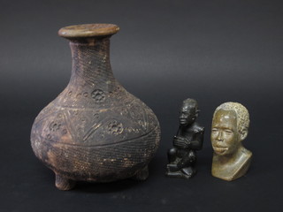 An African terracotta club shaped vase 9", an African carved  portrait bust of a gentleman 4" and 1 other seated gentleman 4  1/2"
