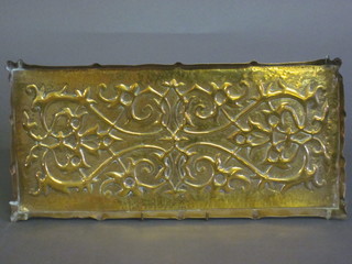 An Art Nouveau rectangular embossed brass tray 16"