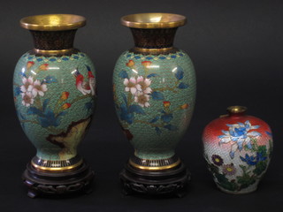 A globular shaped cloisonne vase with floral decoration 4" and 2  green ground cloisonne vases decorated birds amidst branches 6"