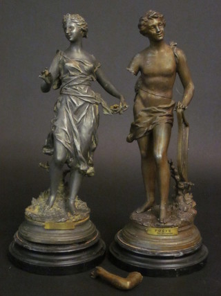A pair of Continental spelter figures in the the form of standing ladies 14"