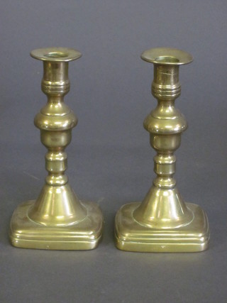 A pair of 19th Century brass candlesticks 7 1/2"