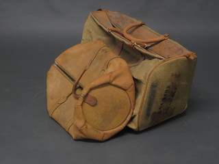 A canvas and leather holdall and 1 other