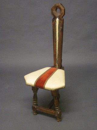 A carved beech spinning chair
