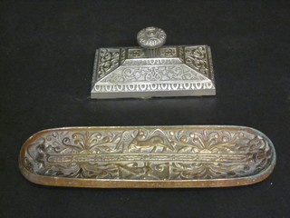 A Victorian rectangular metal paperweight together with an oval brass pen tray, the base marked WT&S