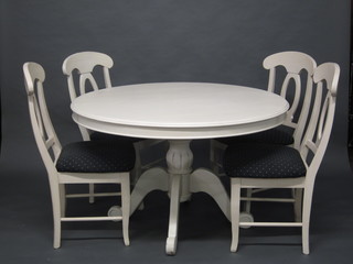 A white finished dining room suite comprising circular pedestal dining table raised on a turned column and tripod base 47",  together with 4 bar back dining chairs