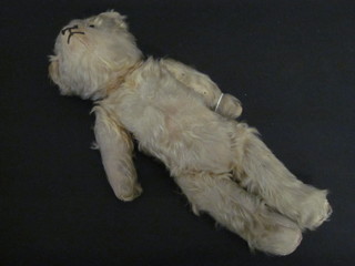 A yellow teddybear with articulated limbs 15"