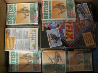 A cardboard box containing a large collection of Airfix models