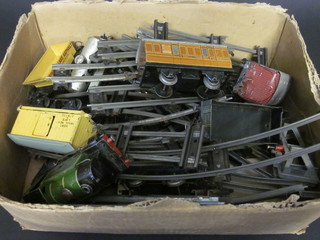A Hornby clockwork locomotive type 101, 6 items of rolling  stock and a collection of various rails