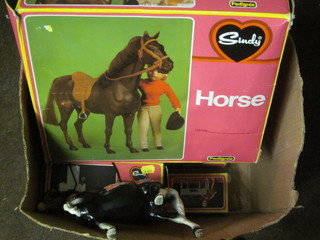 A Sindy horse and a collection of other Sindy items