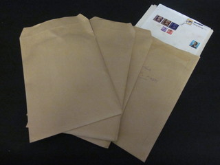 4 large envelopes containing various sheets of stamps