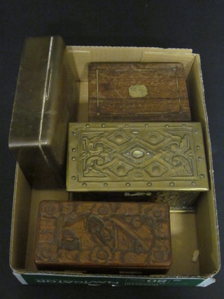 An embossed brass box with hinged lid 7", a brass cigarette box  and 2 carved wooden boxes