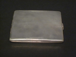 An Art Deco silver cigarette case with engine turned decoration,  Birmingham 1936, 3 1/2 ozs