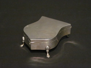 A shield shaped silver trinket box with hinged lid, raised on 3  hoof feet, Birmingham 1919