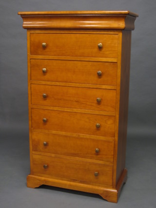 An American style cherrywood pedestal chest of 6 long drawers, raised on bracket feet 30"