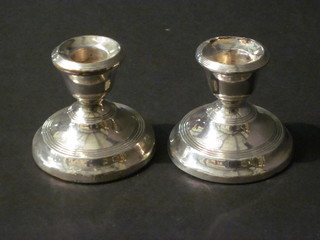 A pair of circular silver stub shaped candlesticks, Birmingham 1924 2"