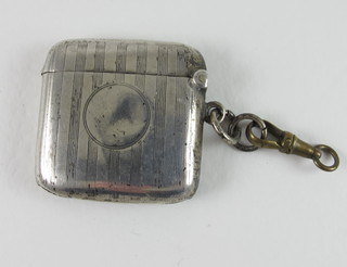 A silver vesta case, Birmingham 1922, hinge f,