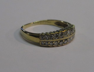 A gold dress ring set 2 rows of diamonds