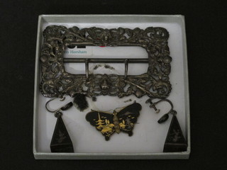 A Victorian pierced silver buckle London 1899 and a suite of niello jewellery comprising pair of earrings and brooch