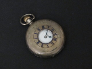 A demi-hunter pocket watch contained in a silver case