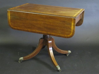 A Georgian mahogany pedestal Pembroke table with inlaid cross banding, fitted a drawer and raised on a pillar and tripod base  34"