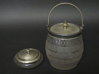 An oval etched glass biscuit barrel with plated mount and a circular glass powder bowl with plated mount