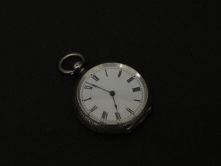 A silver open faced fob watch with enamelled dial