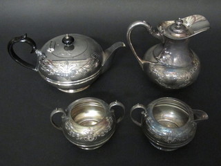 A circular engraved 3 piece silver plated tea service comprising teapot, twin handled sugar bowl and cream jug together with a  Britannia metal hotwater jug