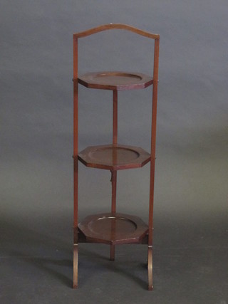 An Art Deco mahogany 3 tier folding cake stand