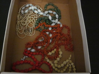 2 coral necklaces, 2 carved ivory necklaces and a collection of necklaces